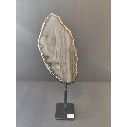 Polished Brazilian agate slice on metal display stand
