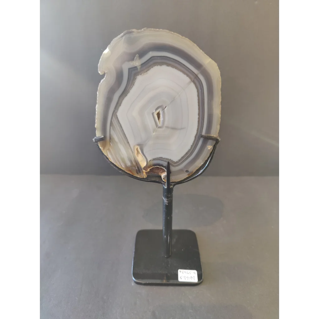 Polished Brazilian agate slice on metal display stand
