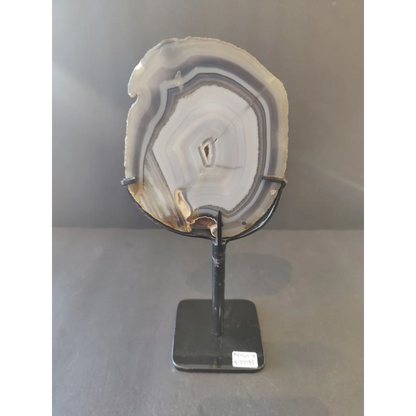 Polished Brazilian agate slice on metal display stand