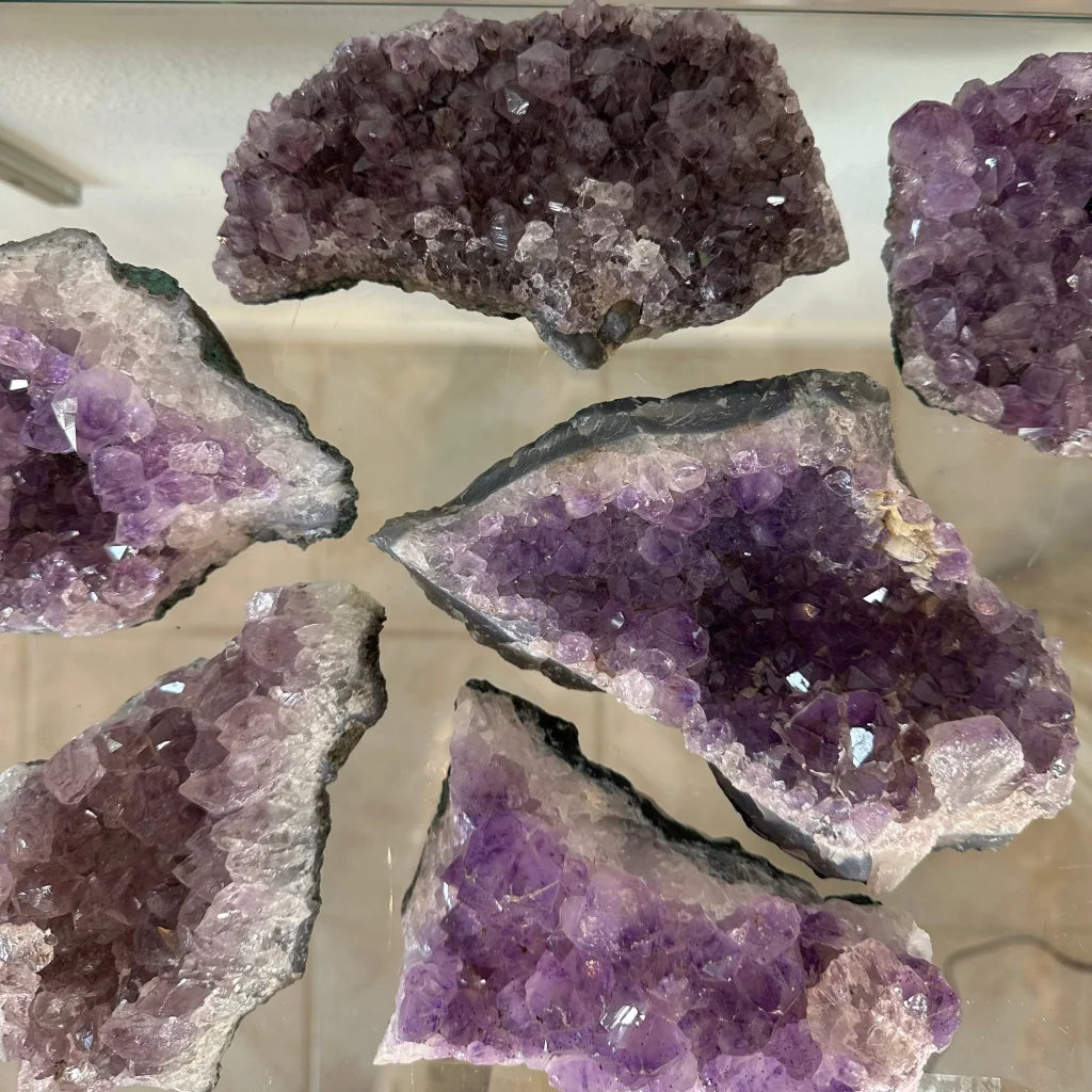 Sparkling Brazilian amethyst druze geode with purple crystals