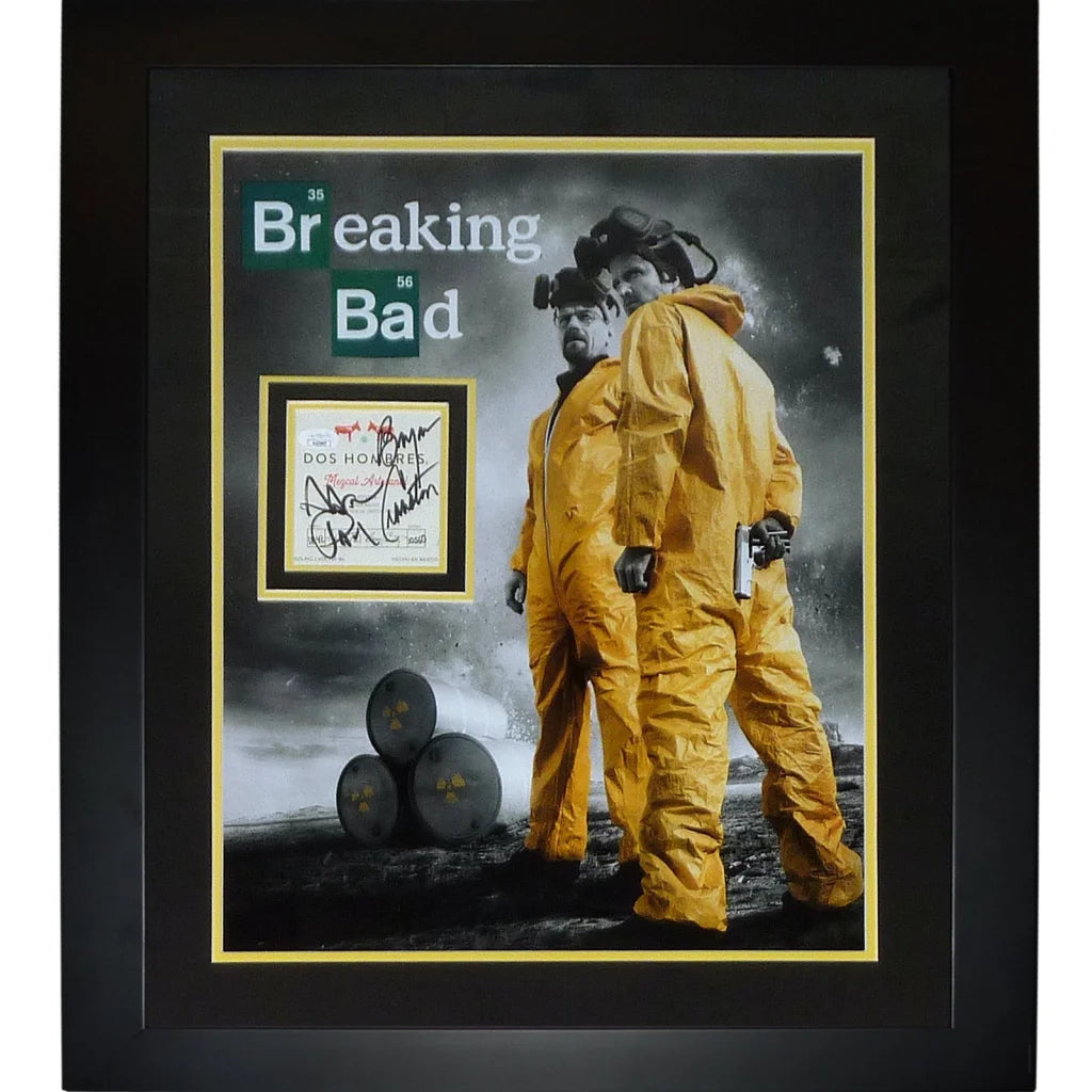 Signed Breaking Bad poster with yellow hazmat suits on black background