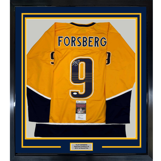 Framed yellow hockey jersey number 9 with "FORSBERG" nameplate, signed, displayed front-facing with JSA certification label and blue and gold borders.