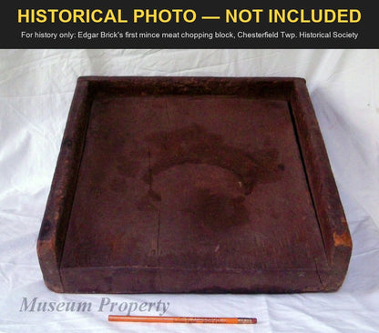 Edgar Brick's first mince meat chopping block, dark wood with raised sides, a pencil beside it for scale; Chesterfield Township Historical Society photo, for history only, not included.