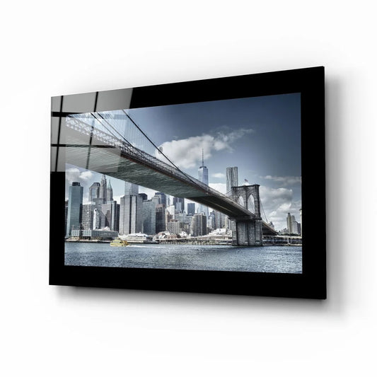 Black-framed Brooklyn Bridge monochrome glass wall art over NYC skyline