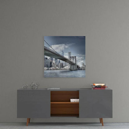 Gray and white Brooklyn Bridge glass wall art with NYC skyline view