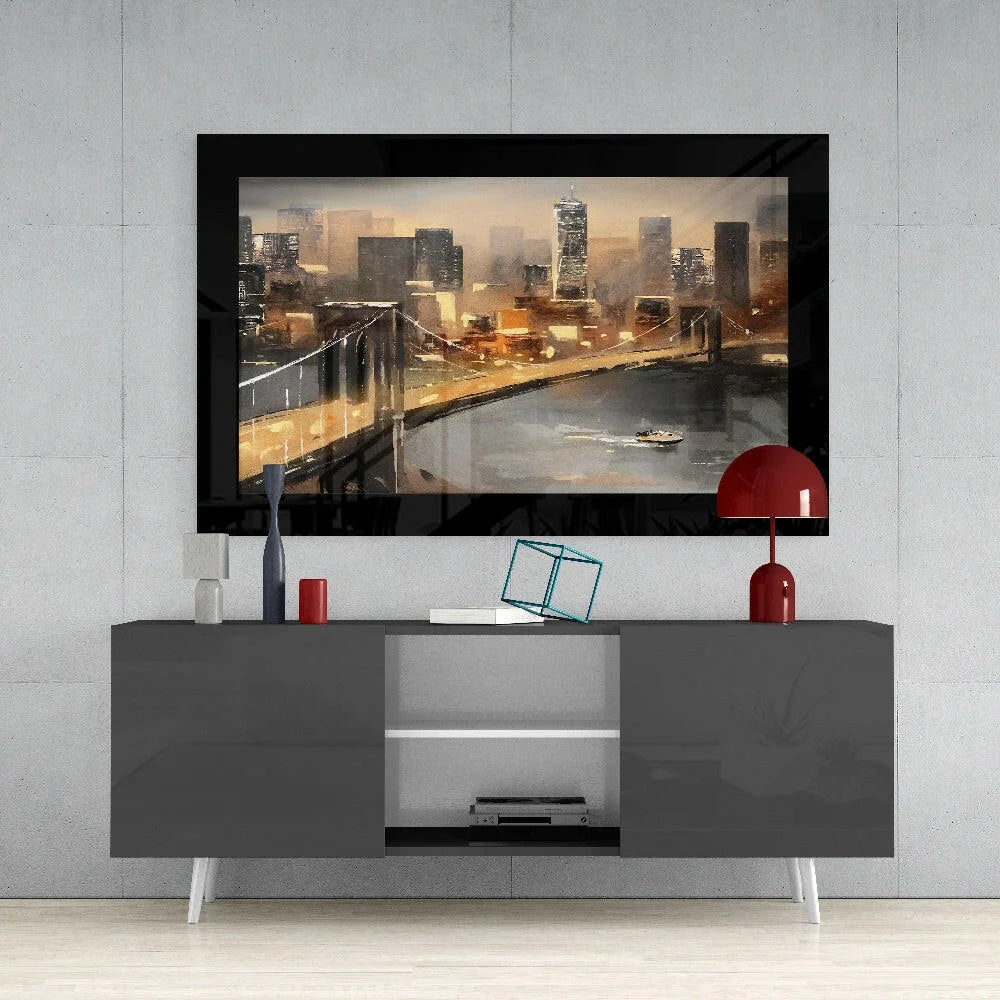 Black-framed glass wall art of cityscape bridge and lit buildings