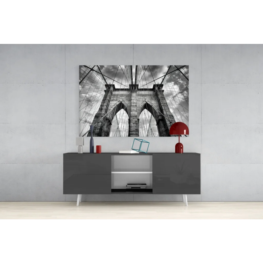 Black-and-white Brooklyn Bridge glass wall art on gray wall