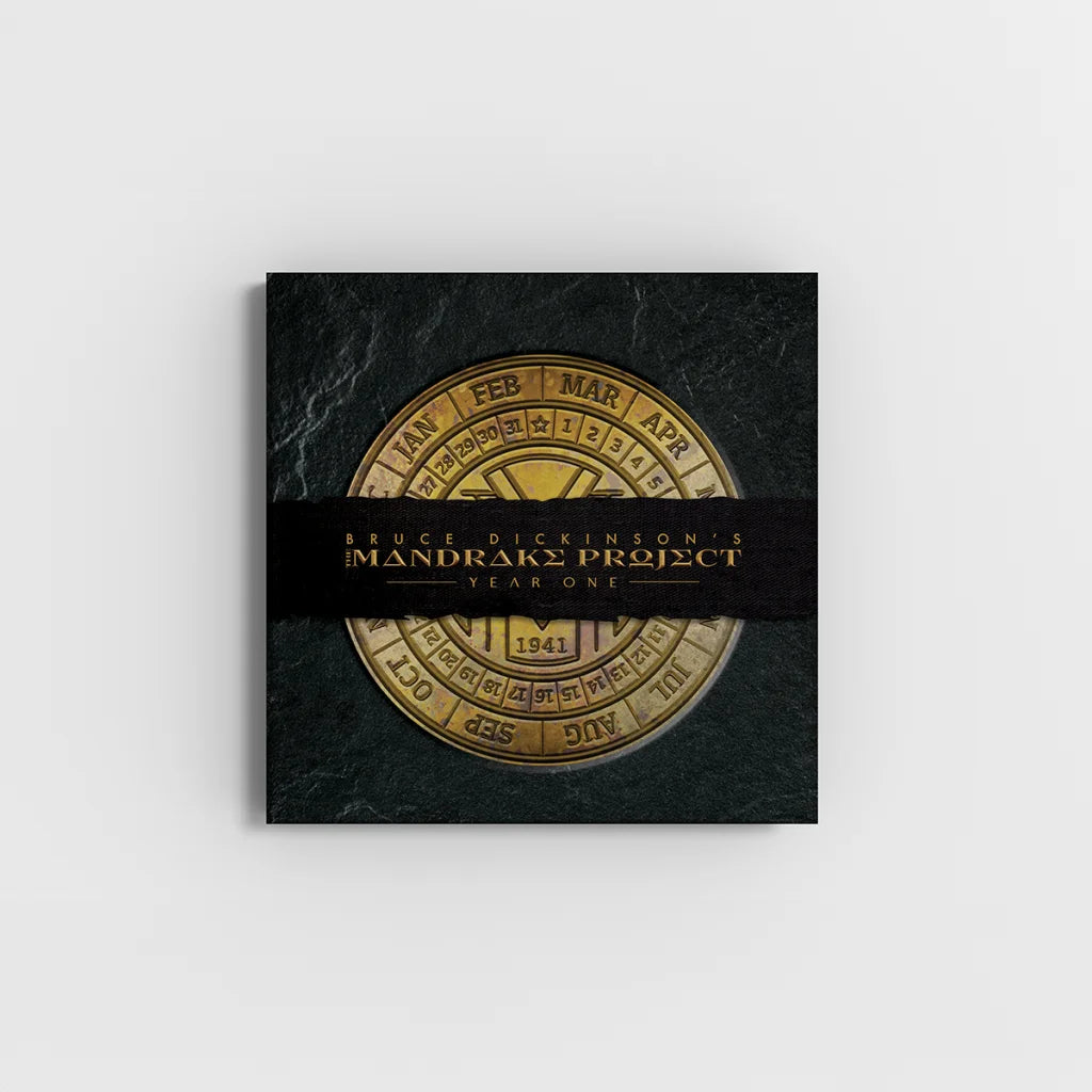 Dark green Bruce Dickinson Mandrake Project Deluxe Edition Book Set album cover with gold calendar dial