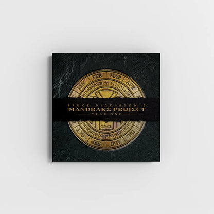 Dark green Bruce Dickinson Mandrake Project Deluxe Edition Book Set album cover with gold calendar dial