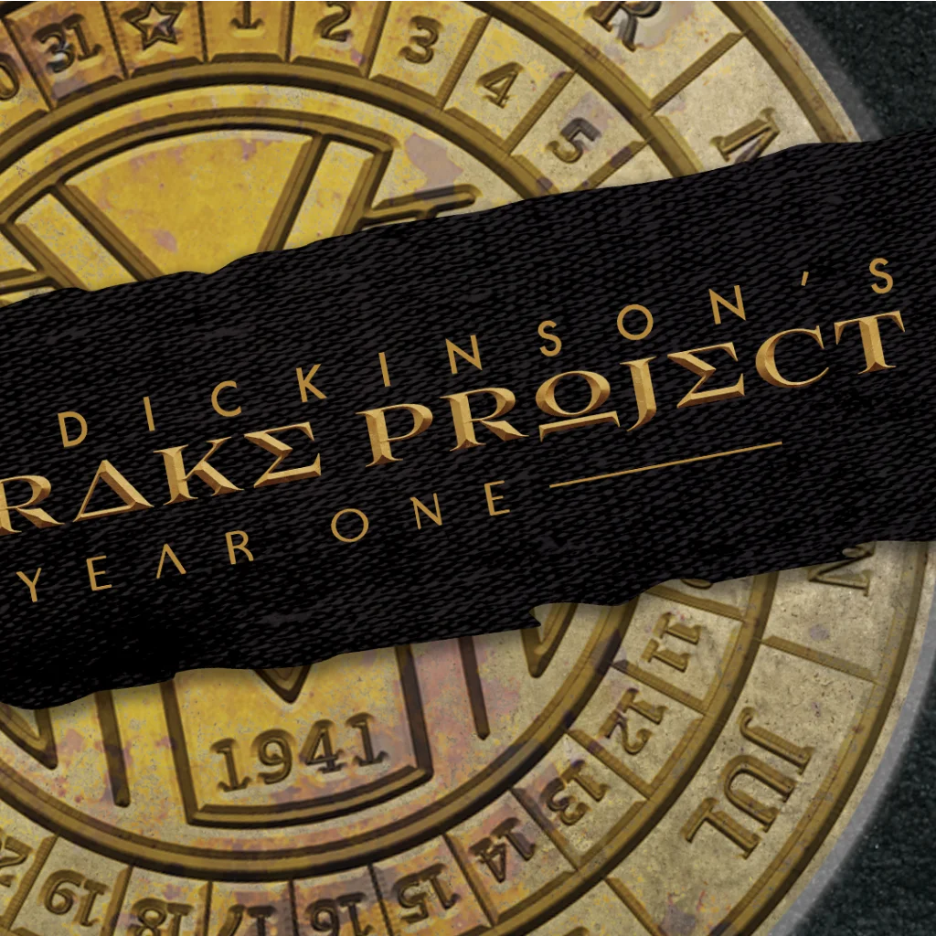 Bronze-colored circular calendar from Bruce Dickinson Mandrake Project Deluxe Edition Book Set