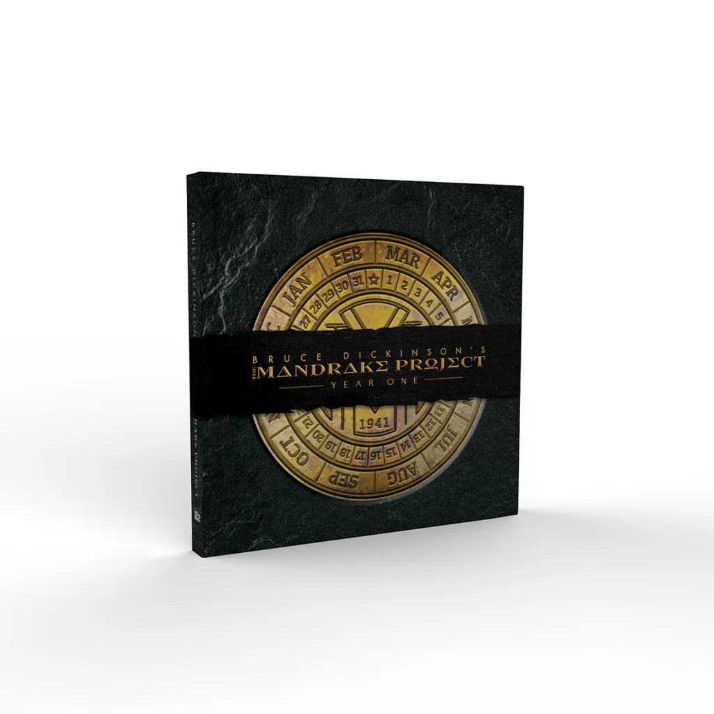 Dark textured box with gold Mandrake Project calendar and black Mandrake dial design