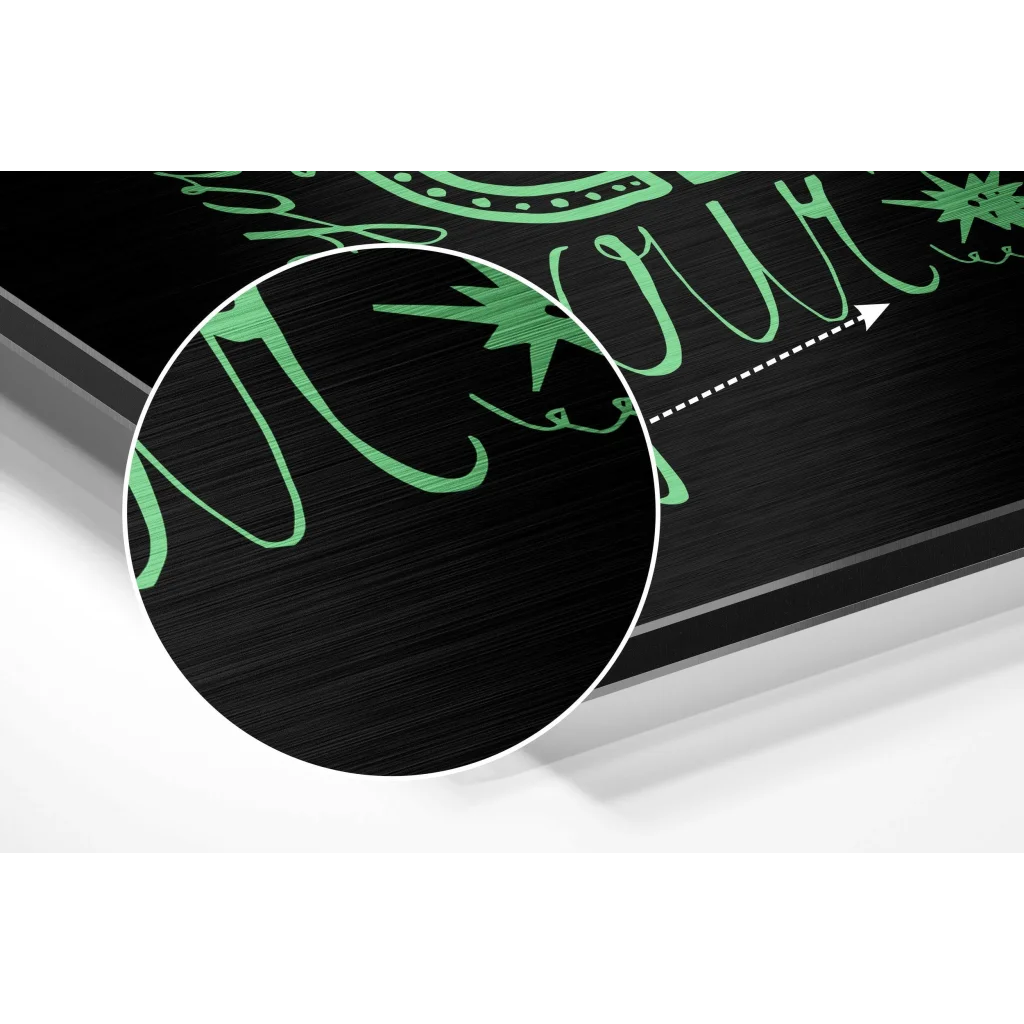 Black metal plaque in brushed aluminium dibond with green cursive lettering