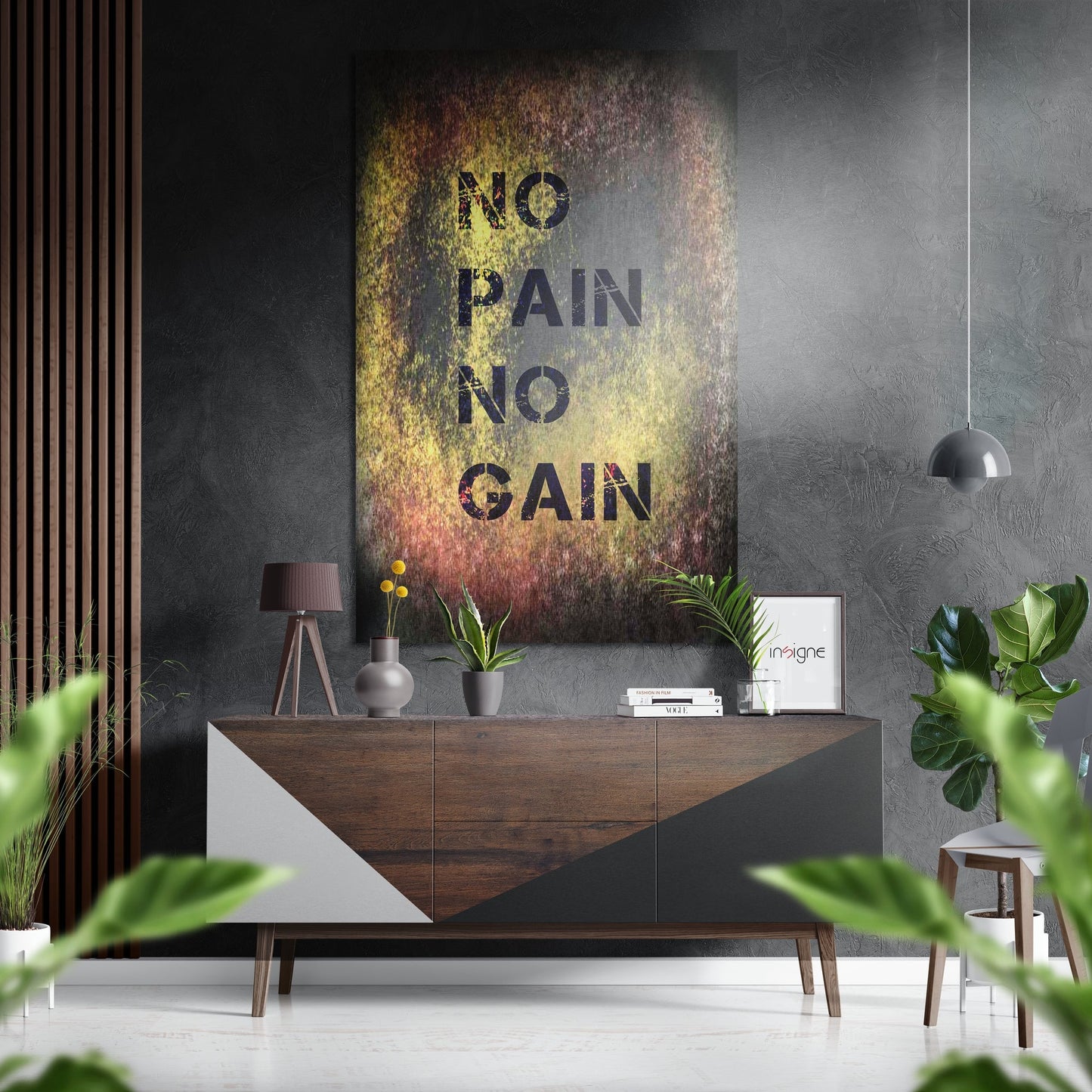 Modern interior scene with "No Pain No Gain" motivational wall art in gold and rust tones above wooden console table with plants and pendant light.
