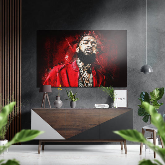 Modern living room displaying red and black portrait artwork of bearded man in red jacket above wooden dresser with plants and decor.