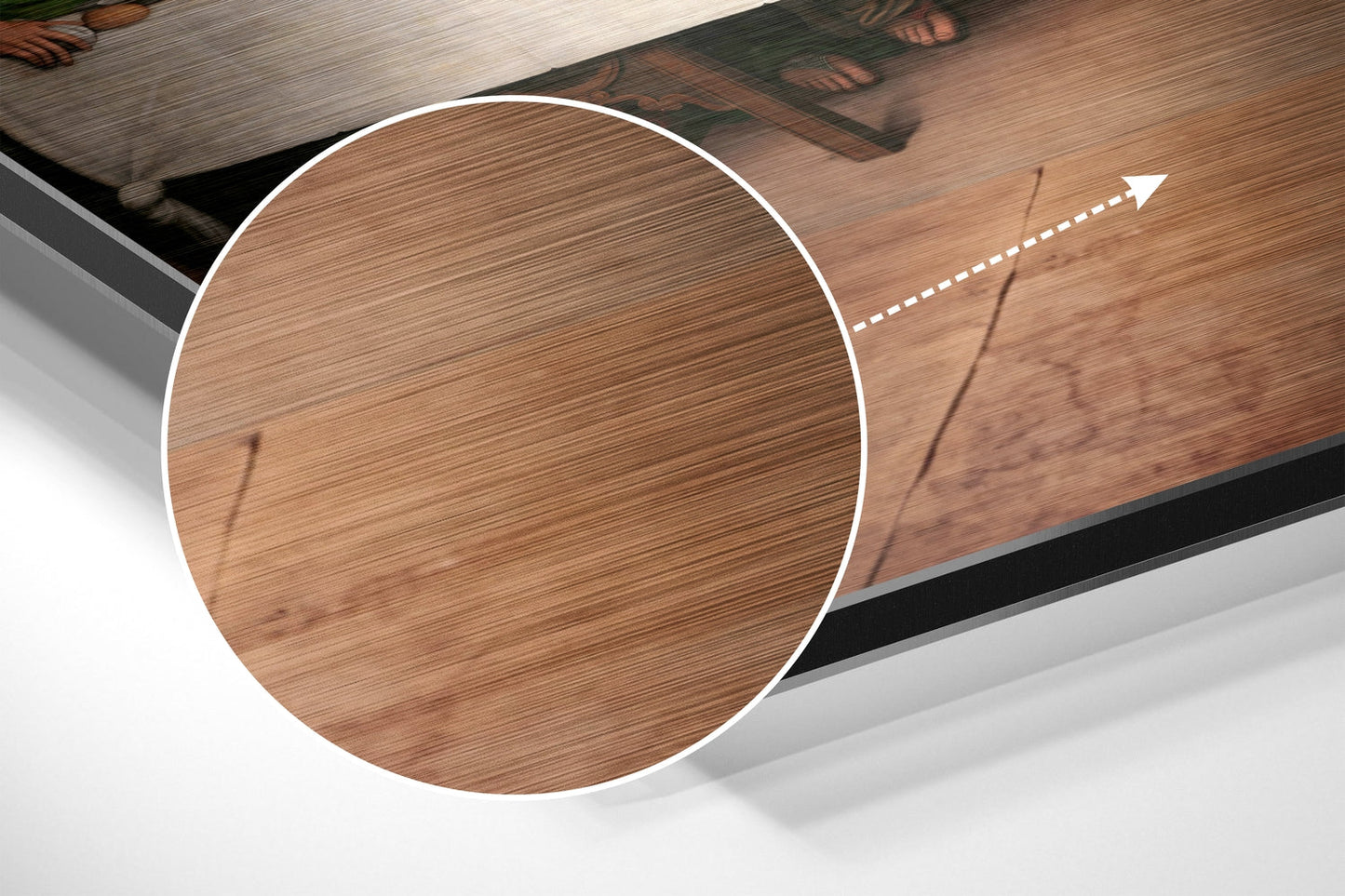 Close-up circular detail of brushed wood-grain surface with white border and directional arrow on angled Last Supper wall art.