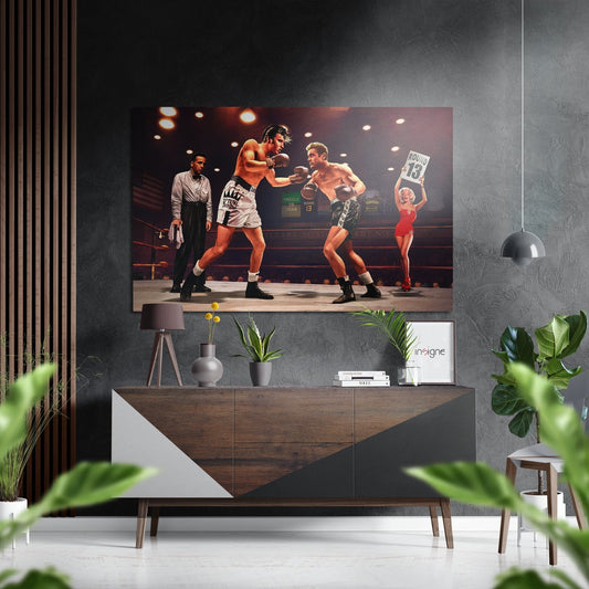 Vintage boxing match scene printed on brushed aluminium dibond displayed above wooden console table in modern living room.
