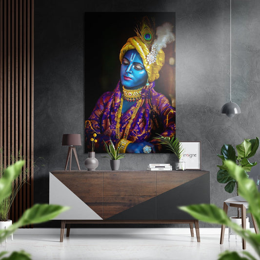 Krishna Brushed Aluminium Dibond Wall Art displayed above wooden dresser in modern interior with grey textured walls and green plants.