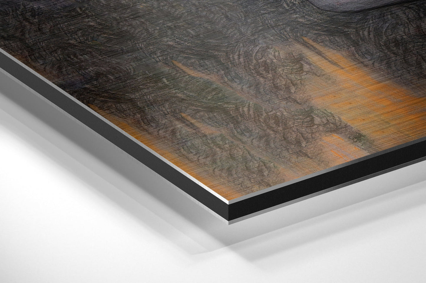 Close-up angled view of layered Dibond panel edges showing dark wood grain texture top surface with white and black backing layers visible.