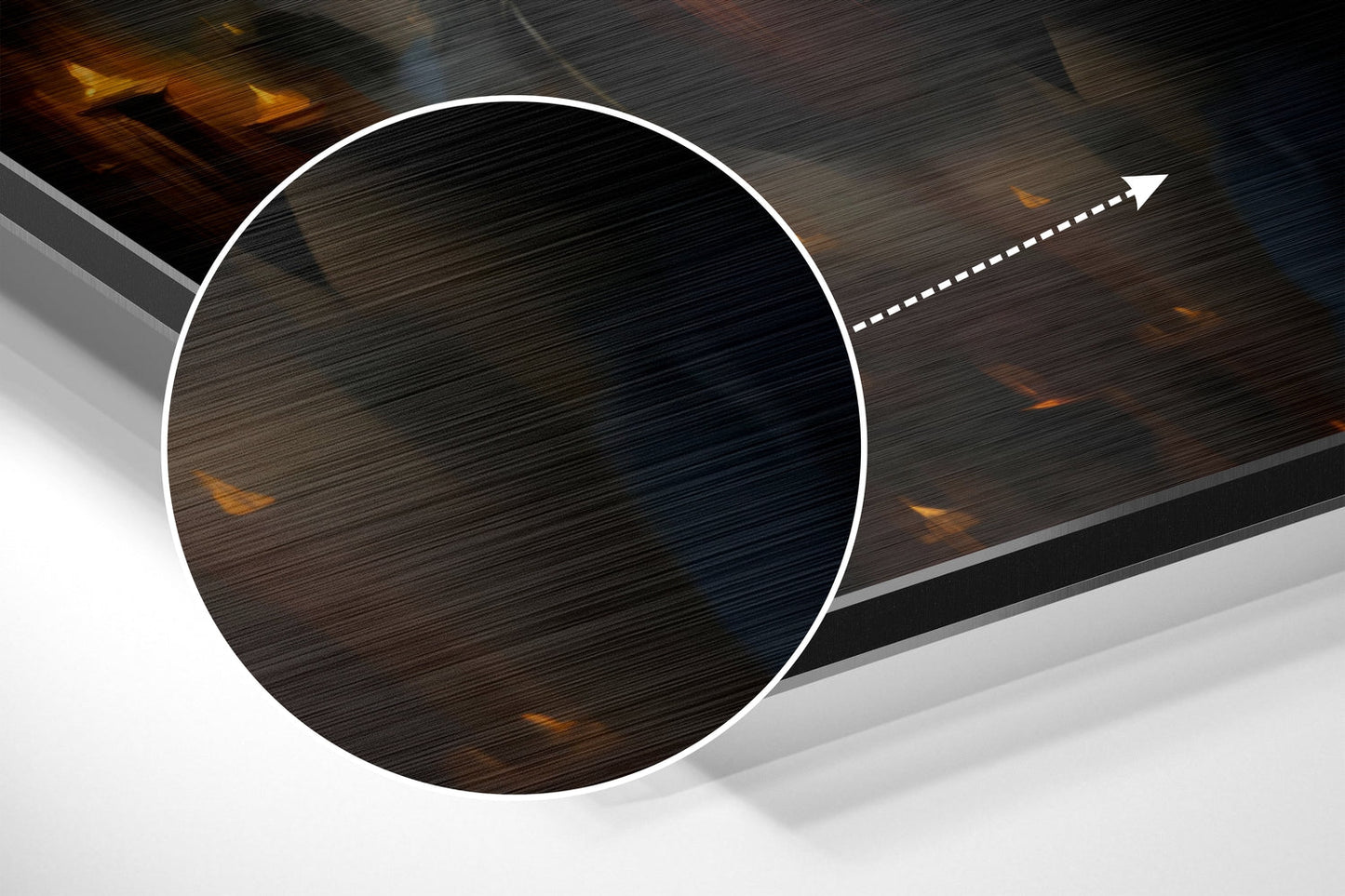 Dark brushed aluminum circle with white border and directional arrow, angled perspective view on layered background.