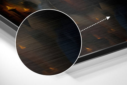 Dark brushed aluminum circle with white border and directional arrow, angled perspective view on layered background.
