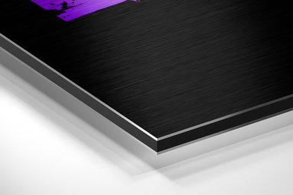 Angled close-up of layered brushed aluminum and white composite materials showing edge detail and metallic finish.