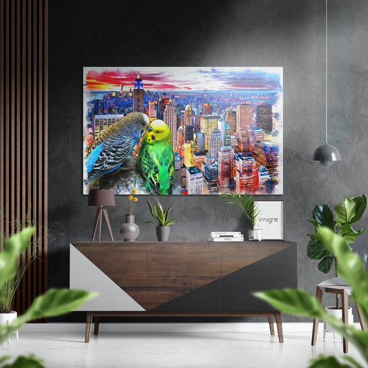 Colorful brushed aluminum wall art of two budgies displayed above a wooden console table in a modern interior setting.