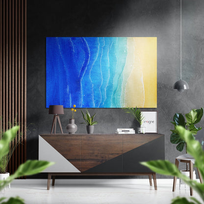 Beach Brushed Aluminium Dibond Wall Art displaying blue ocean gradient transitioning to yellow sand, hung above wooden console table in modern interior.