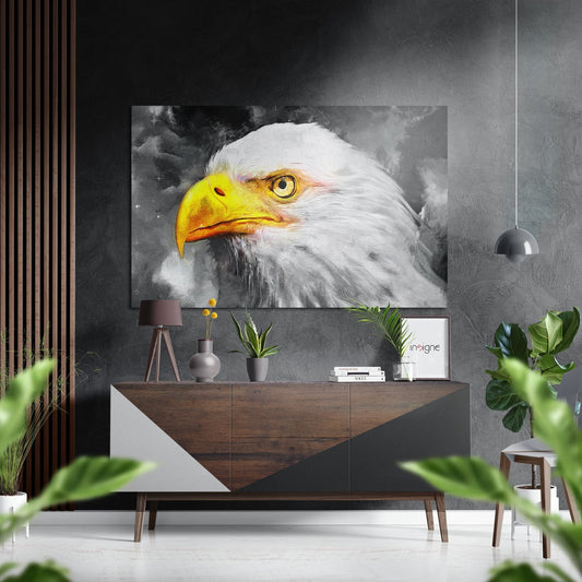 Eagle wall art with yellow beak and white head displayed above wooden console in modern interior with plants and decor.