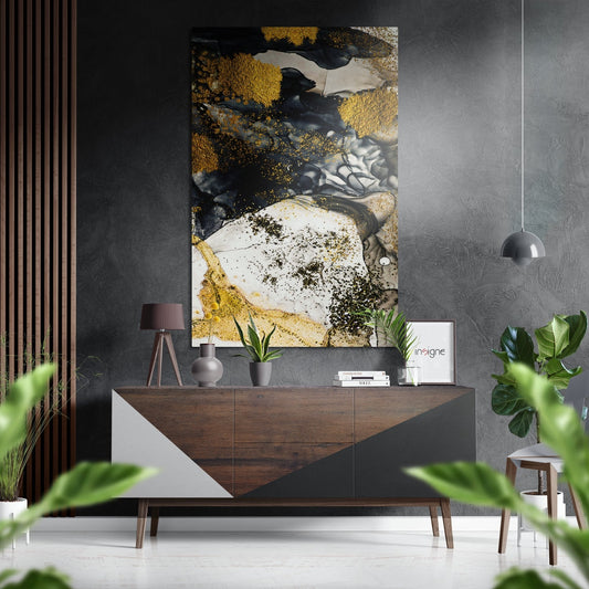 Golden Marble Brushed Aluminium Dibond Wall Art displayed above a wood and white dresser in a modern interior setting with plants and pendant lighting.