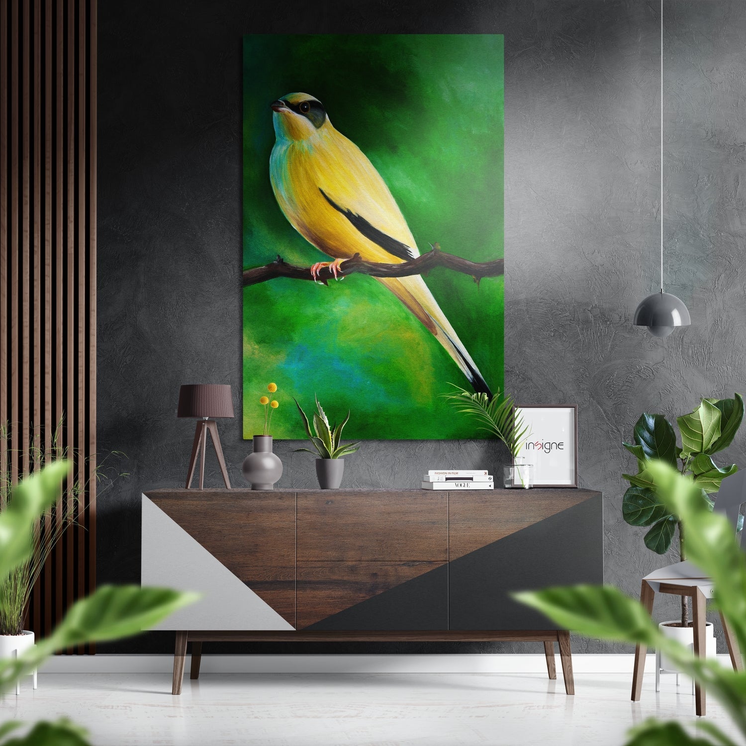 Yellow canary on dark branch against vibrant green gradient background, displayed above wooden dresser in modern interior setting.