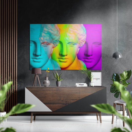 Modern interior space featuring vibrant neon rainbow classical bust artwork mounted above wooden credenza with plants and decor.