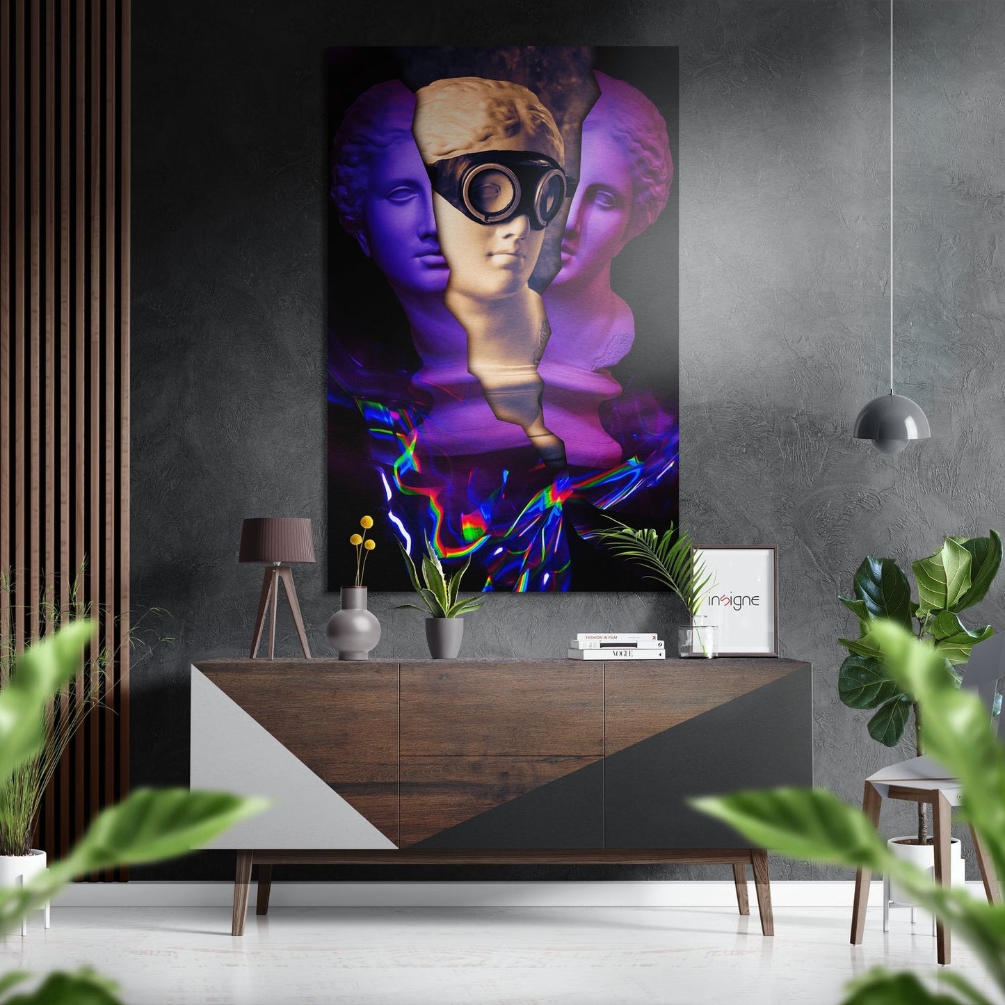 Modern interior scene featuring colorful digital art print of classical busts with purple lighting and neon effects displayed above wooden console table with accessories.