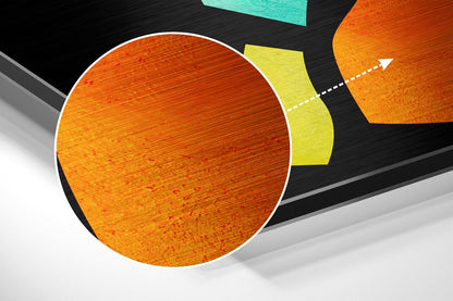Abstract 3D graphic showing orange circular brushed metal disc with yellow, turquoise, and orange geometric shapes and directional arrow.