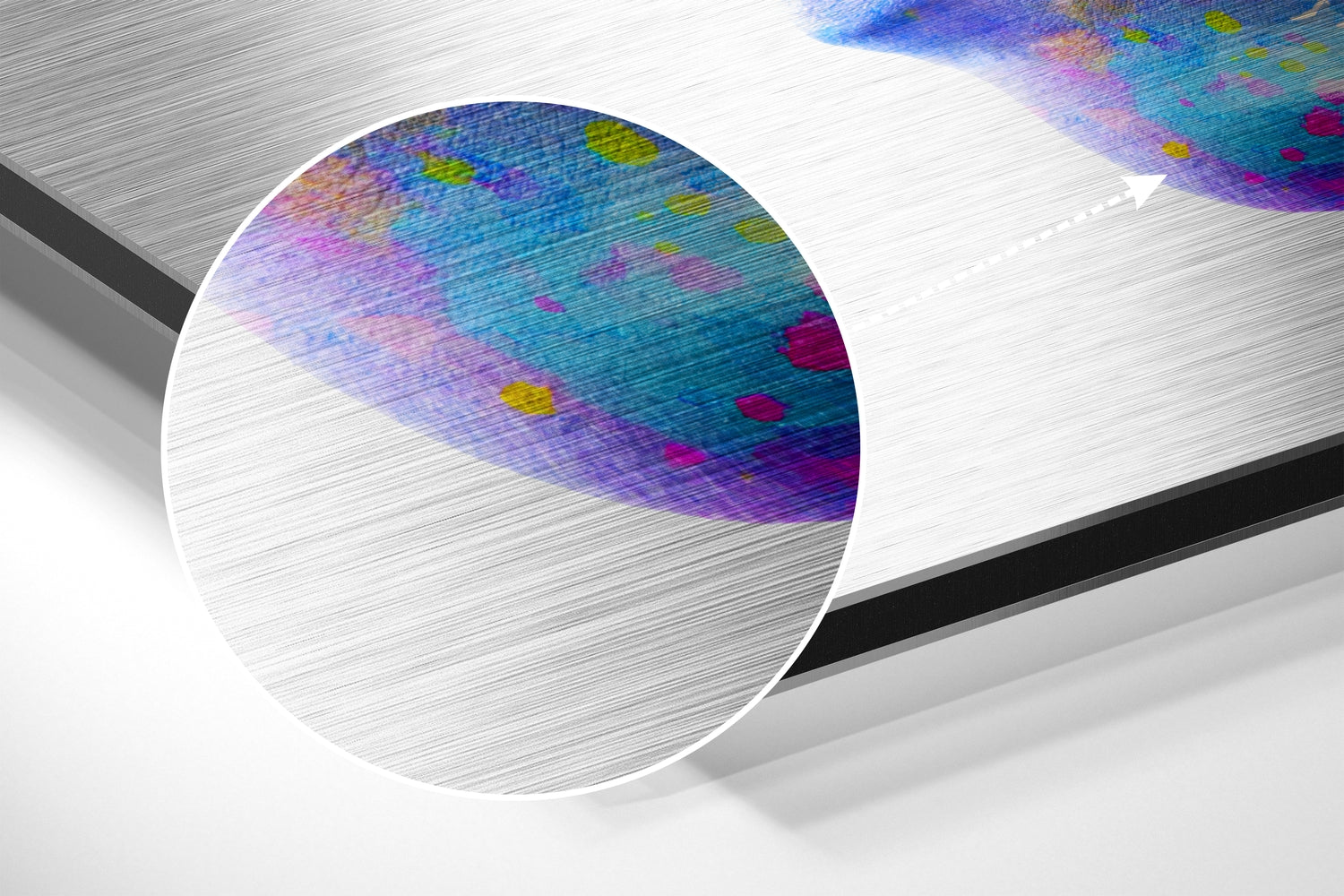 Angled close-up of brushed aluminium Dibond showing colorful abstract gradient design with blue, purple, pink, and yellow pixelated patterns on metallic surface.