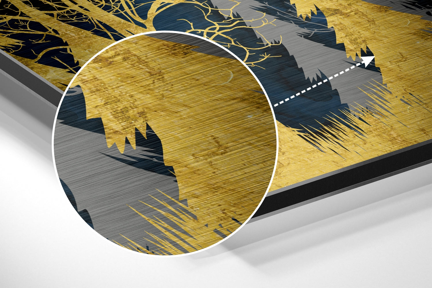 Close-up angled view of Golden Forest Dibond art showing magnified brushed aluminum texture with gold and dark blue forest silhouettes.