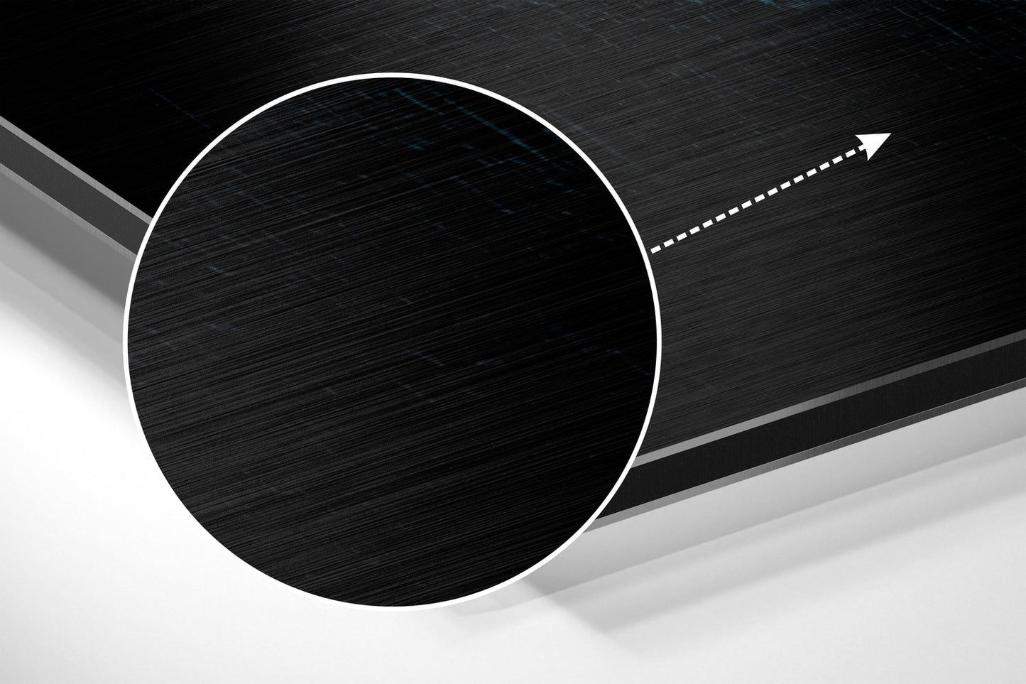 Modern abstract wall art featuring a large white-outlined black circle on brushed aluminum with directional arrow detail.