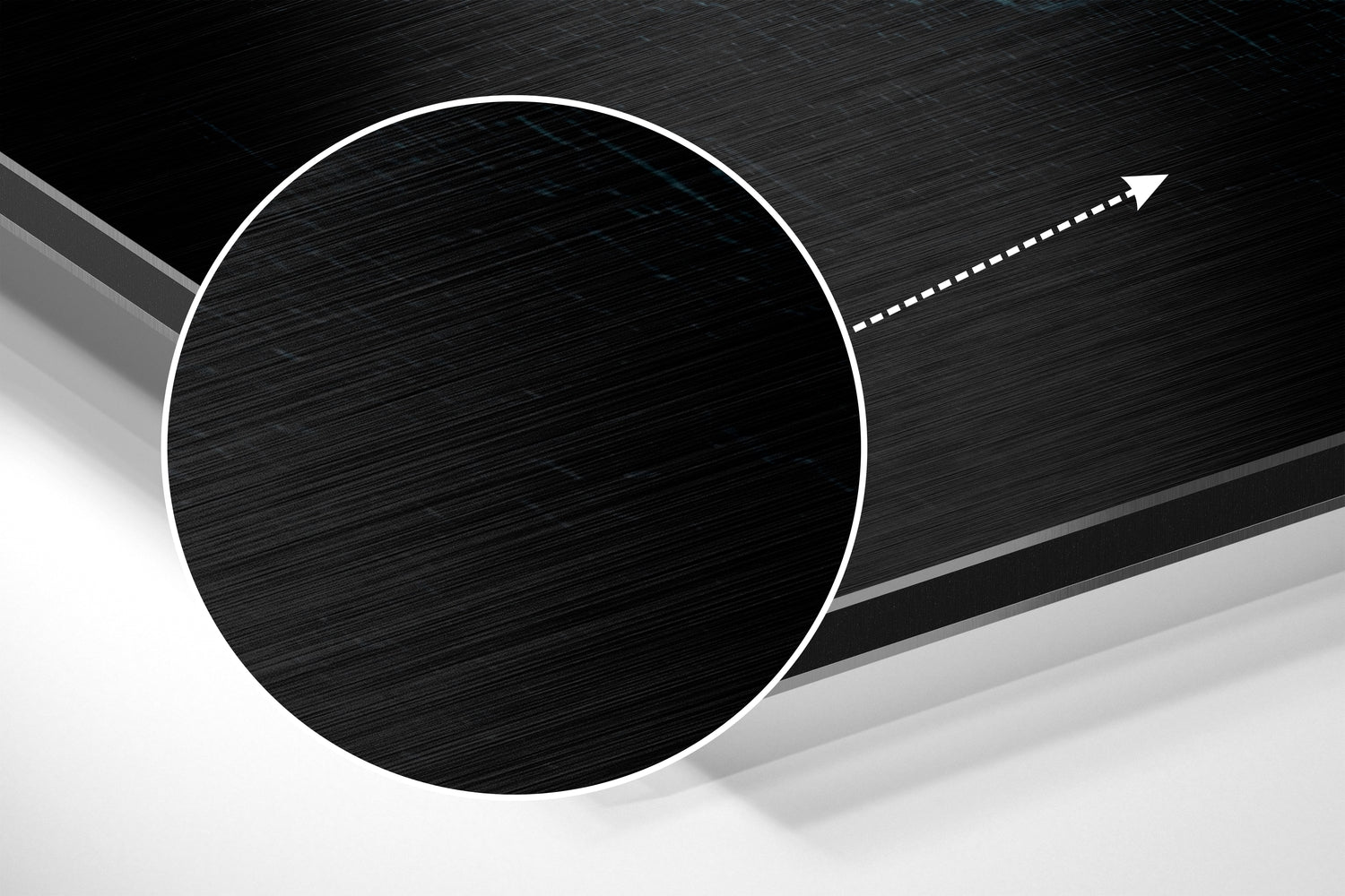 Modern abstract wall art featuring a large white-outlined black circle on brushed aluminum with directional arrow detail.