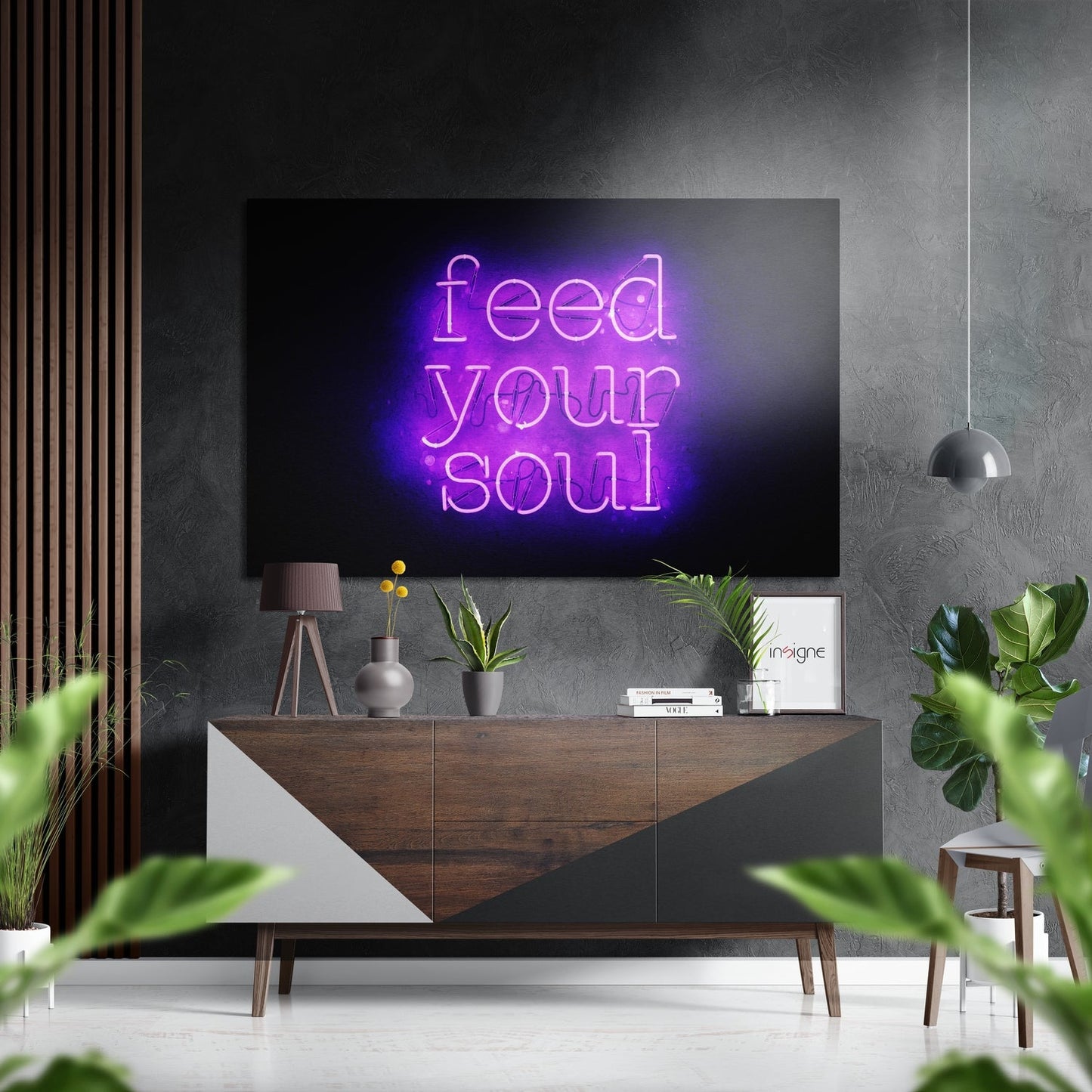 Modern living room with "Feed Your Soul" purple neon sign displayed on wall above wooden console table with plants and decor.