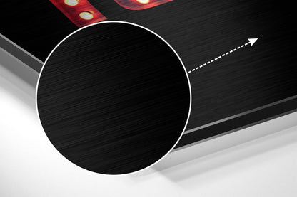 Modern abstract composition featuring a large white-outlined black circle on brushed aluminum with diagonal gray planes and red accents.