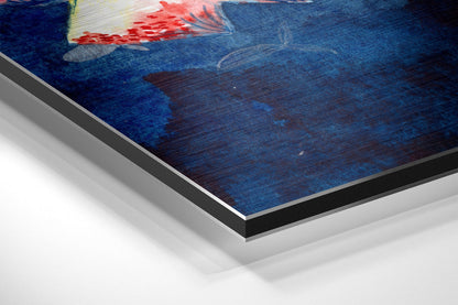 Close-up angled view of brushed aluminium Dibond wall art showing layered edges and fish artwork with red and blue tones on dark background.