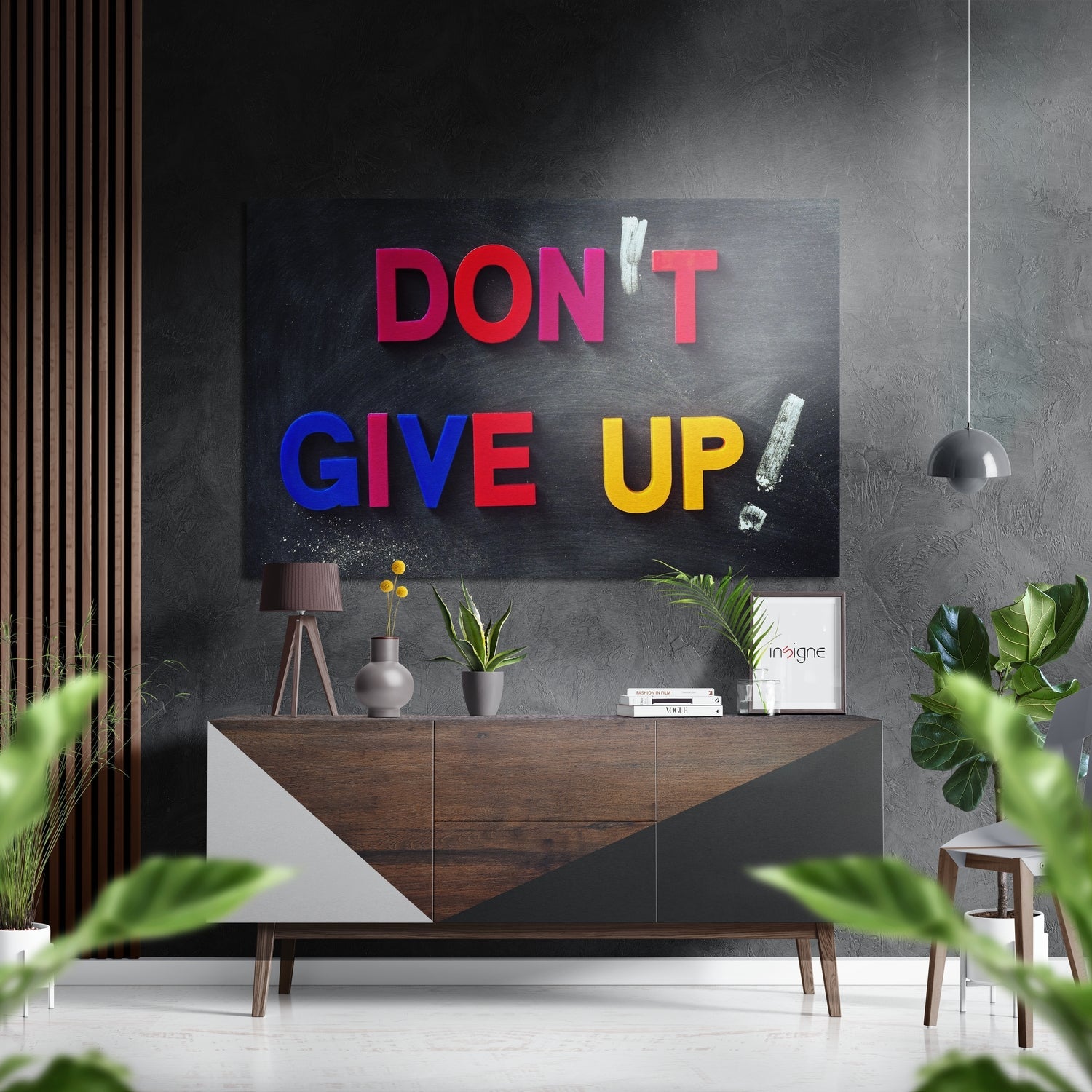 Modern interior featuring red, blue, and yellow "DON'T GIVE UP" neon-style wall art above wooden console table with plants.