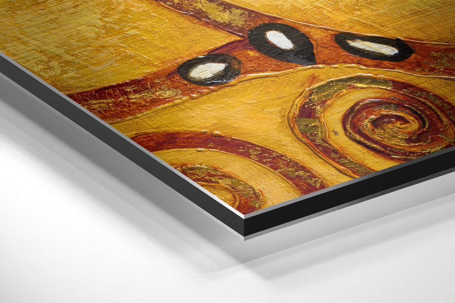 Close-up angled view of Klimt's Tree of Life brushed aluminum dibond wall art showing gold, red, and brown tones with layered edge construction.
