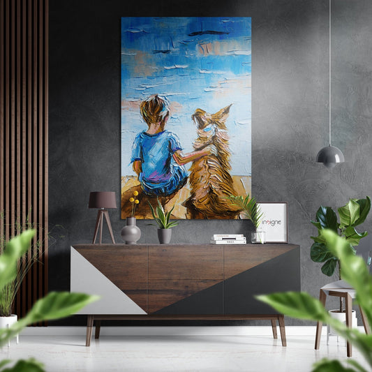 Modern interior with child and dog painting displayed above wooden console table with decor and plants.
