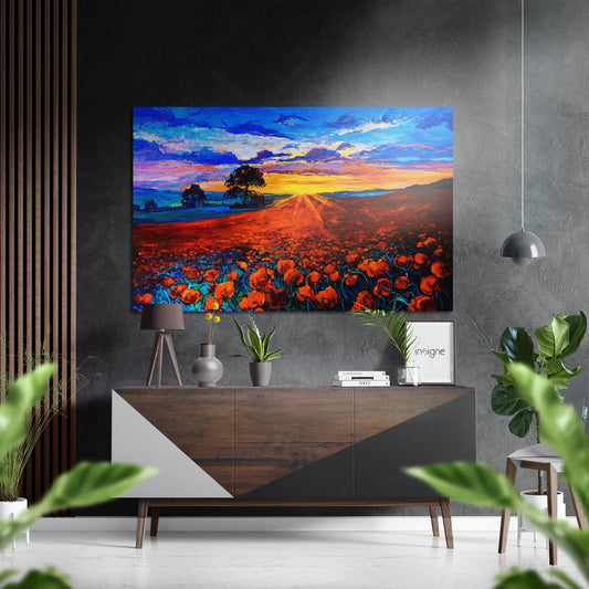 Vibrant poppy field wall art with sunset sky displayed above wooden console table in modern interior setting.