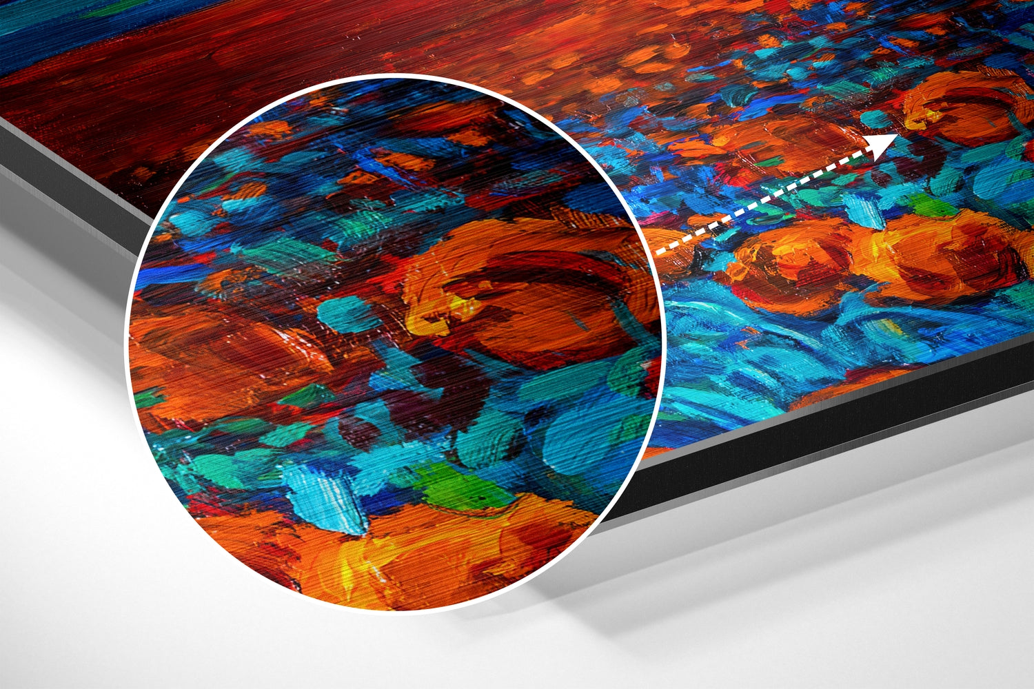 Close-up detail view of vibrant red, blue, orange, and teal brushstrokes on aluminium surface with magnification circle highlighting texture.