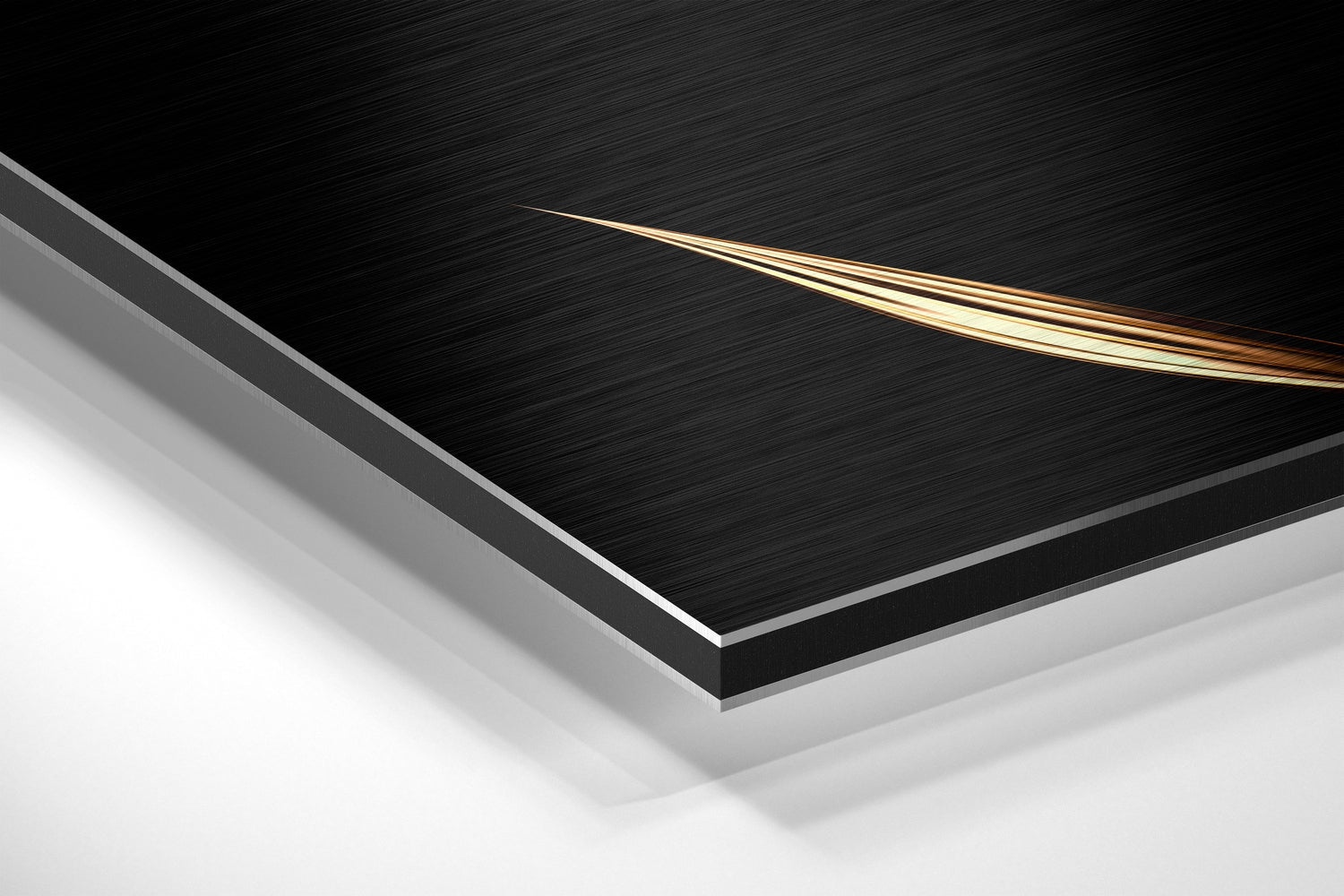 Angled perspective view of layered black brushed aluminum and white surface with gold curved line accent detail.