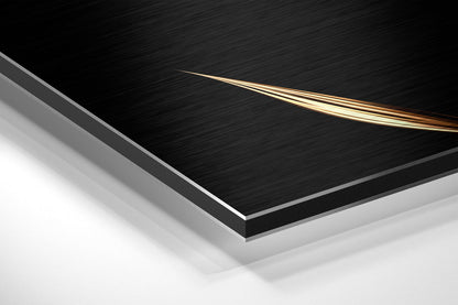 Angled perspective view of layered black brushed aluminum and white surface with gold curved line accent detail.