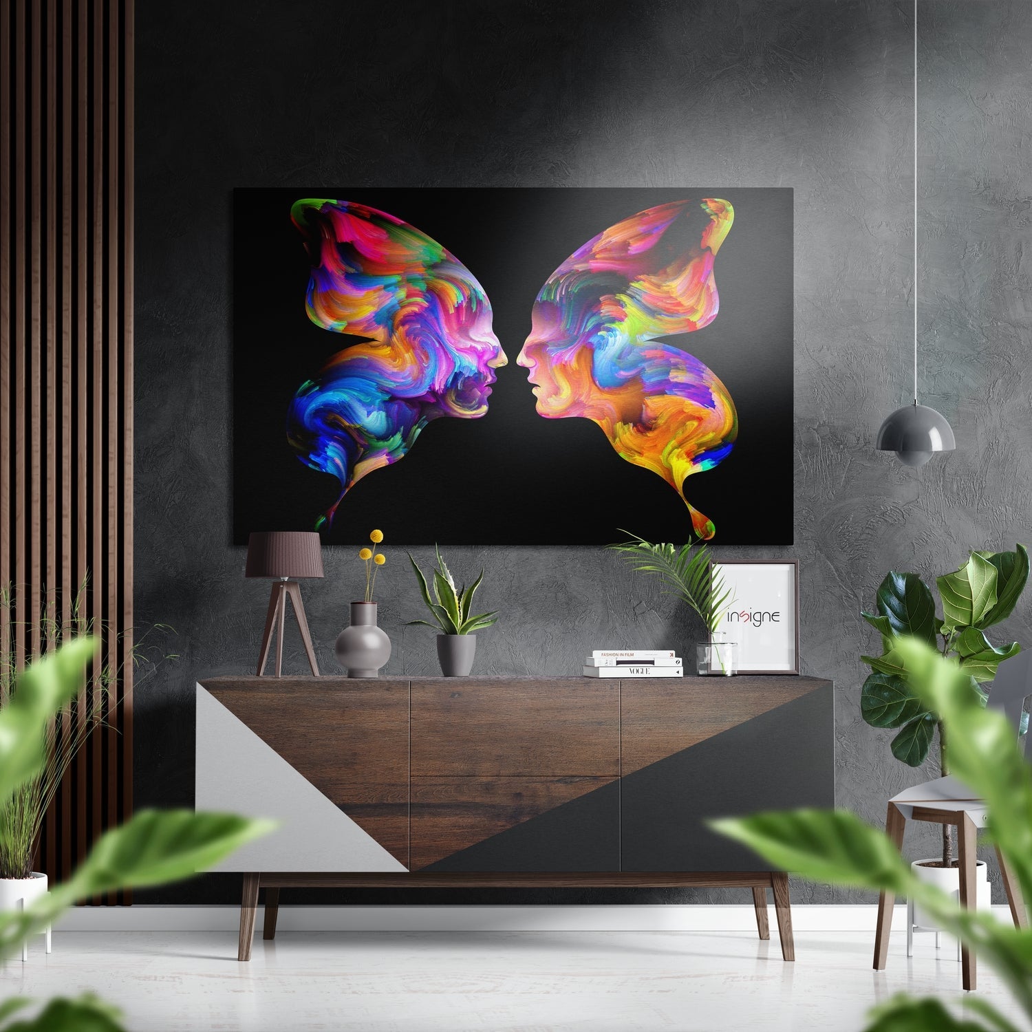 Vibrant multicolored abstract face profiles with flowing psychedelic patterns displayed on black metal wall art above wooden console.