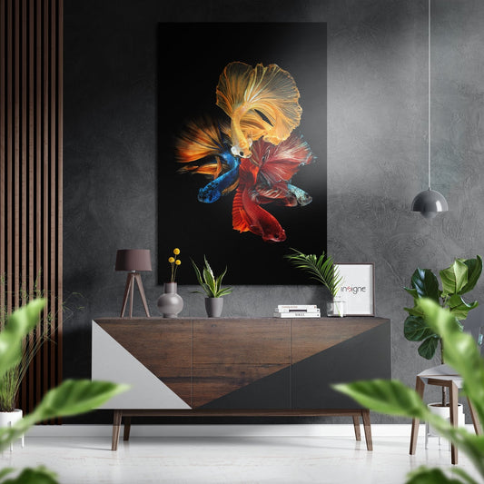 Modern interior with Bettas Brushed Aluminium Dibond Wall Art displaying four colorful fighting fish in gold, blue, and red against black background above wooden console table.