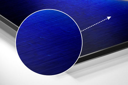 Angled 3D product view of brushed blue aluminum ring with white border and directional arrow on layered blue and gray background.
